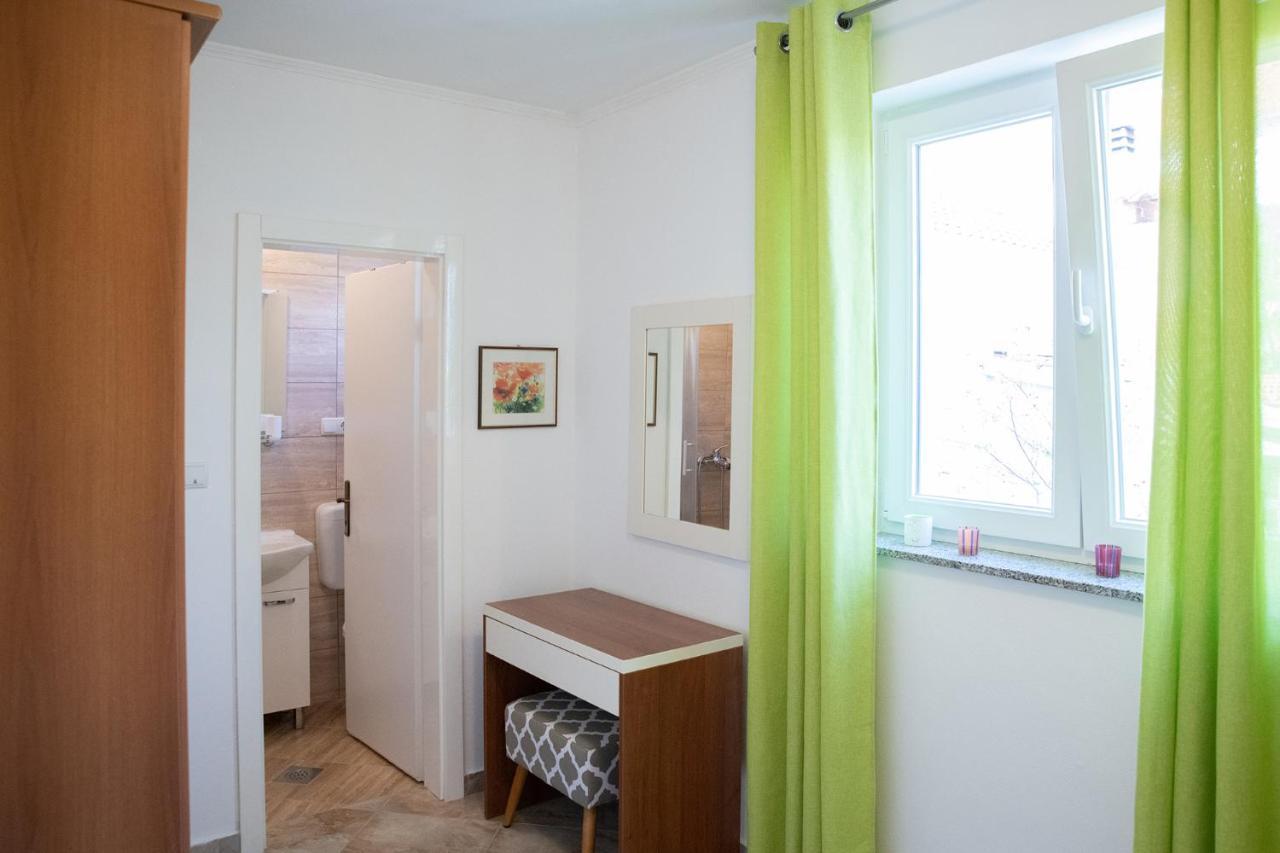 Apartmani Vrtodusic Banjol Buitenkant foto