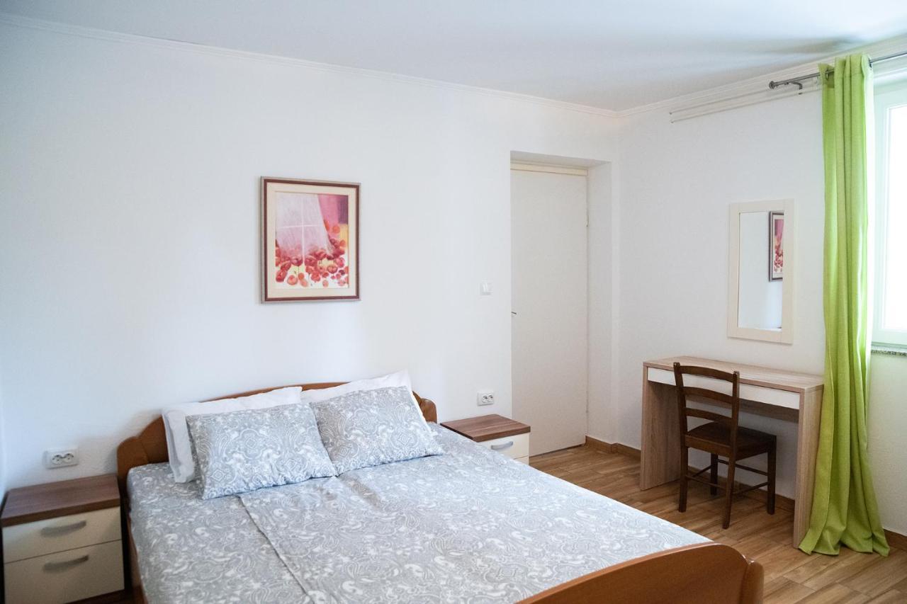 Apartmani Vrtodusic Banjol Buitenkant foto