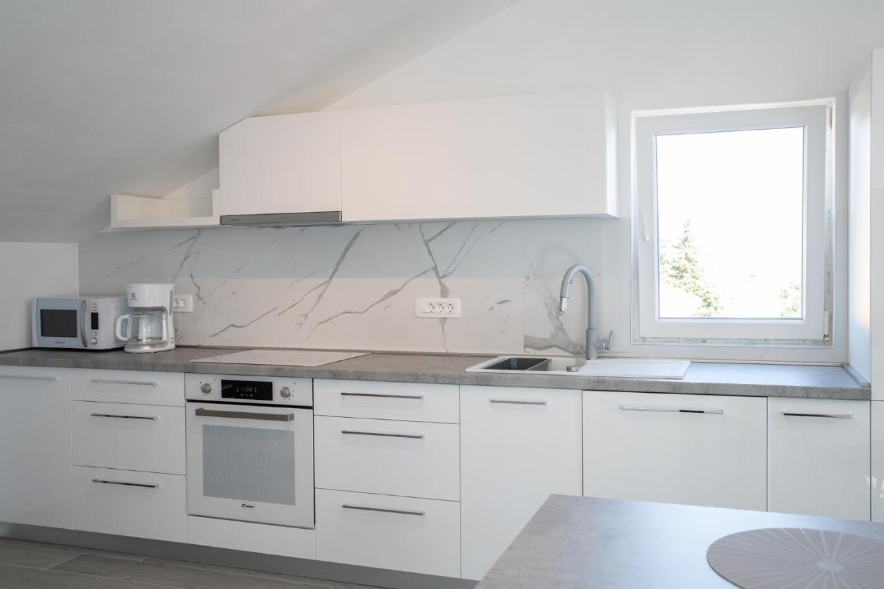 Apartmani Vrtodusic Banjol Buitenkant foto